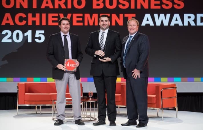 Rich and Andy Kinsman receive the Ontario Chamber of Commerce Sustainability award for Confederation's environmental commitment